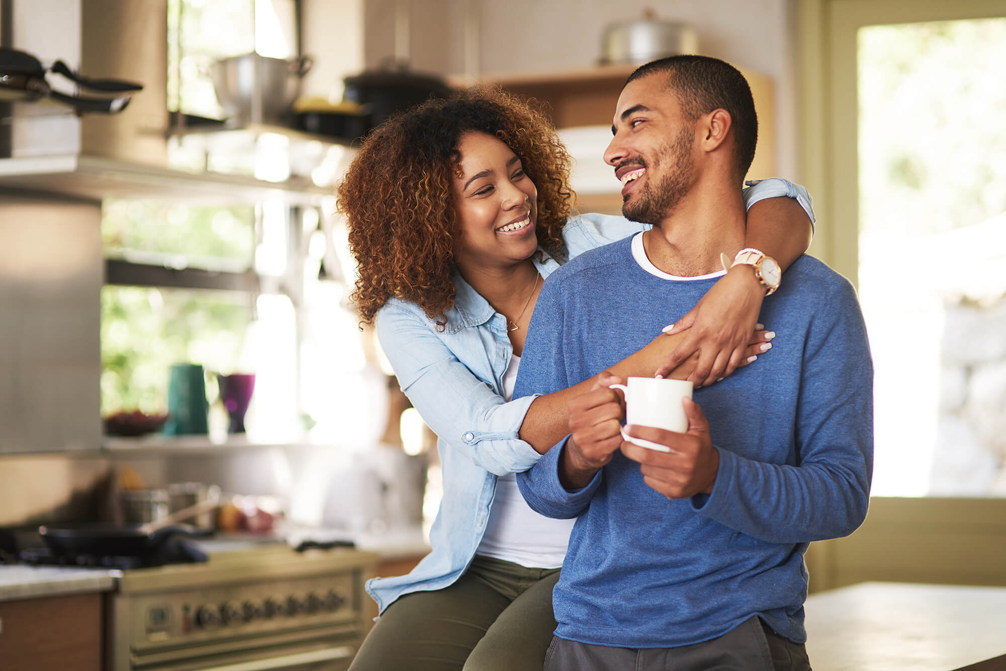 iStock-639583980(young-couple-in-kitchen-diverse)