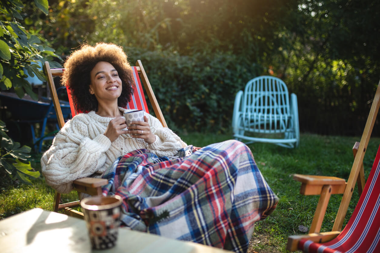 Woman enjoying backyard of new home