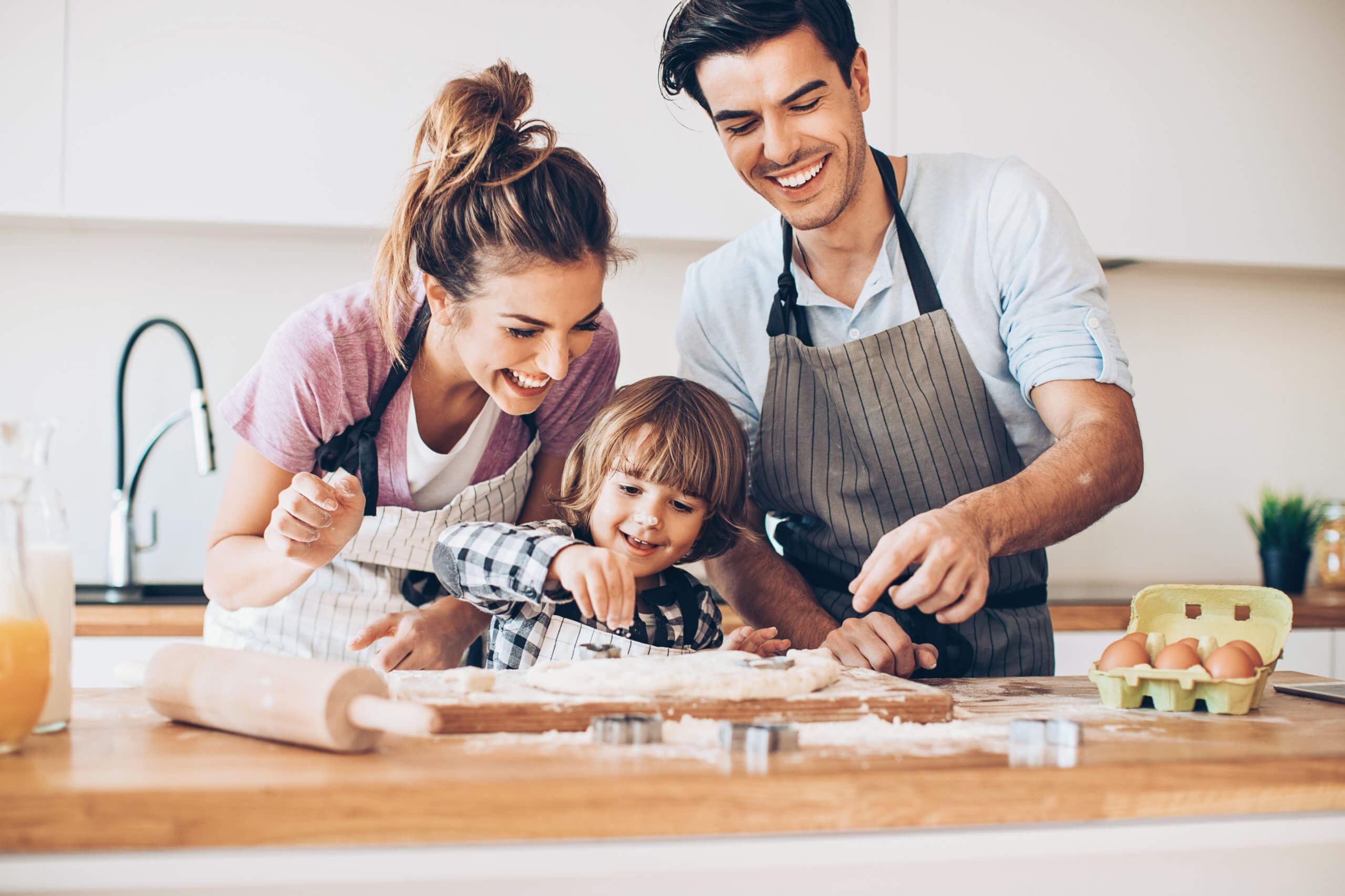 Helping mom and dad in making cookies