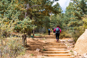 woman walking up the manitou incline in colorado springs