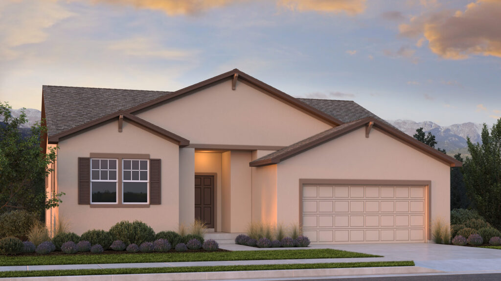 Pale stucco single-story house with brown trim, recessed entry and two-car garage at sunset.