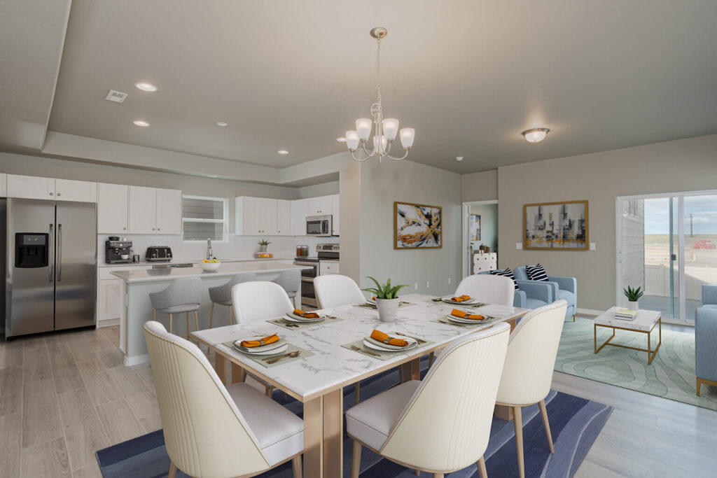 Kitchen and dining space with marble-look table, breakfast bar, stainless appliances, and chandelier.